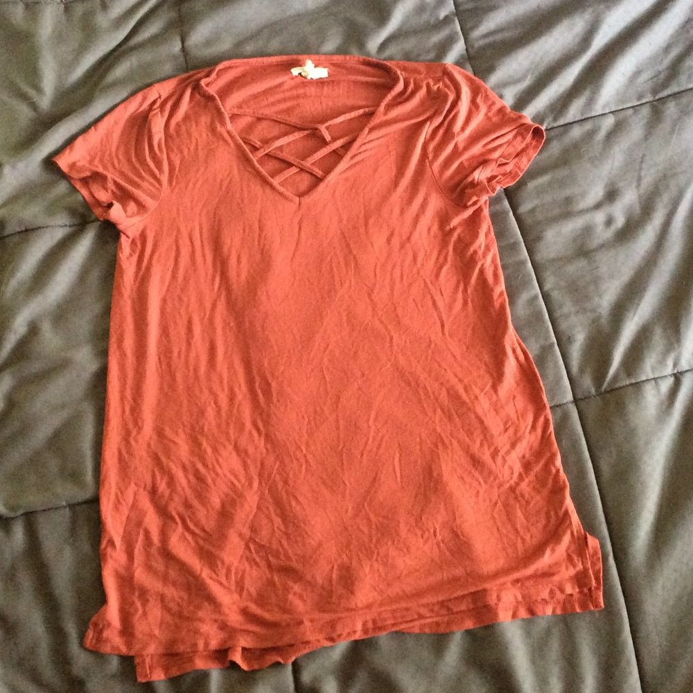 an orange silk blouse
